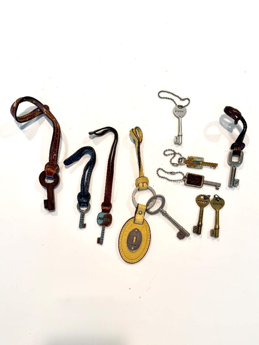 FOSSIL Lot of 10 Key Hangtag Charms